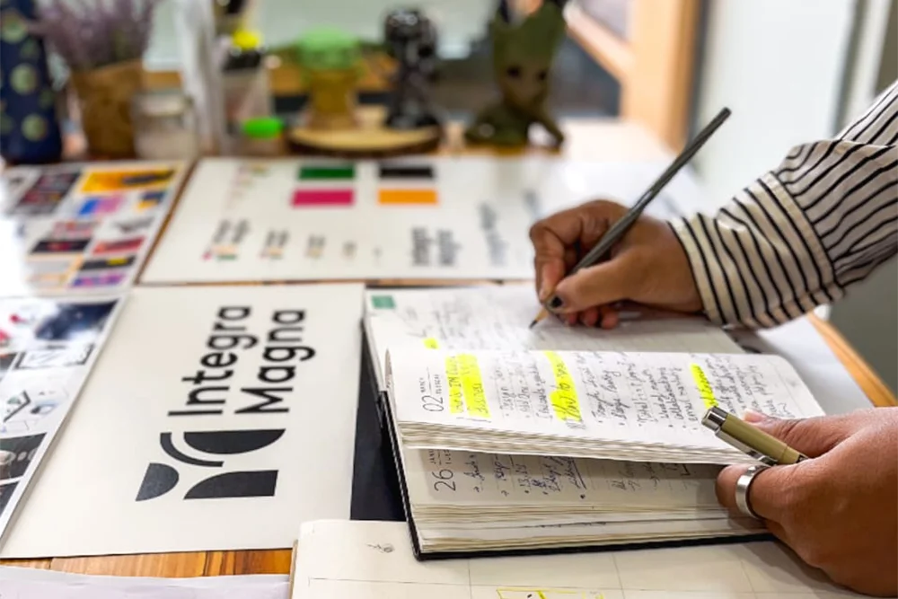 Ideation sketches of a Logo Design on a table