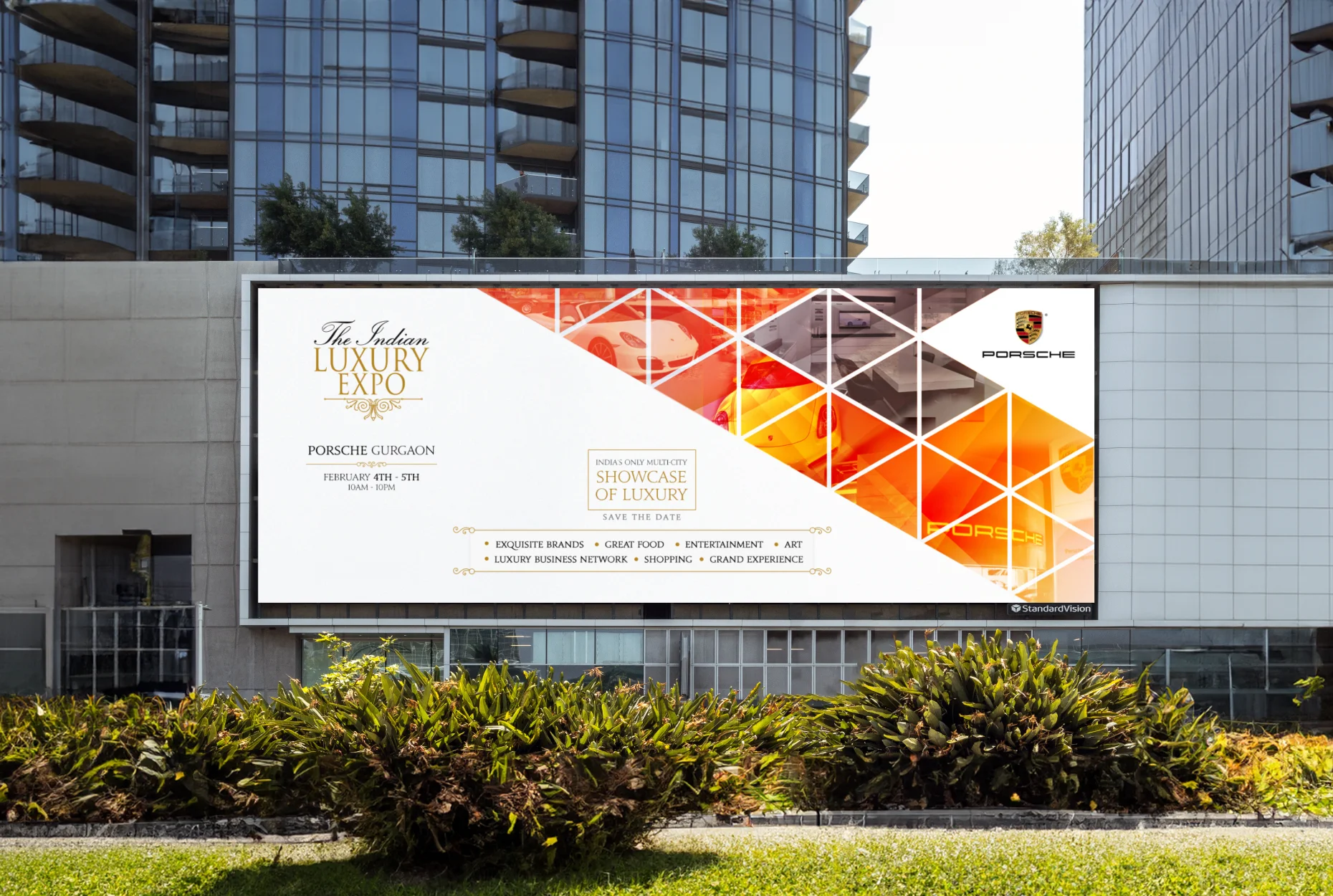 Large building banner advertising The Indian Luxury Expo with an event invite collab with Porsche.